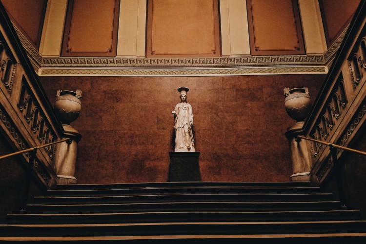 Wide Staircase with Statue and Urns on First Landing